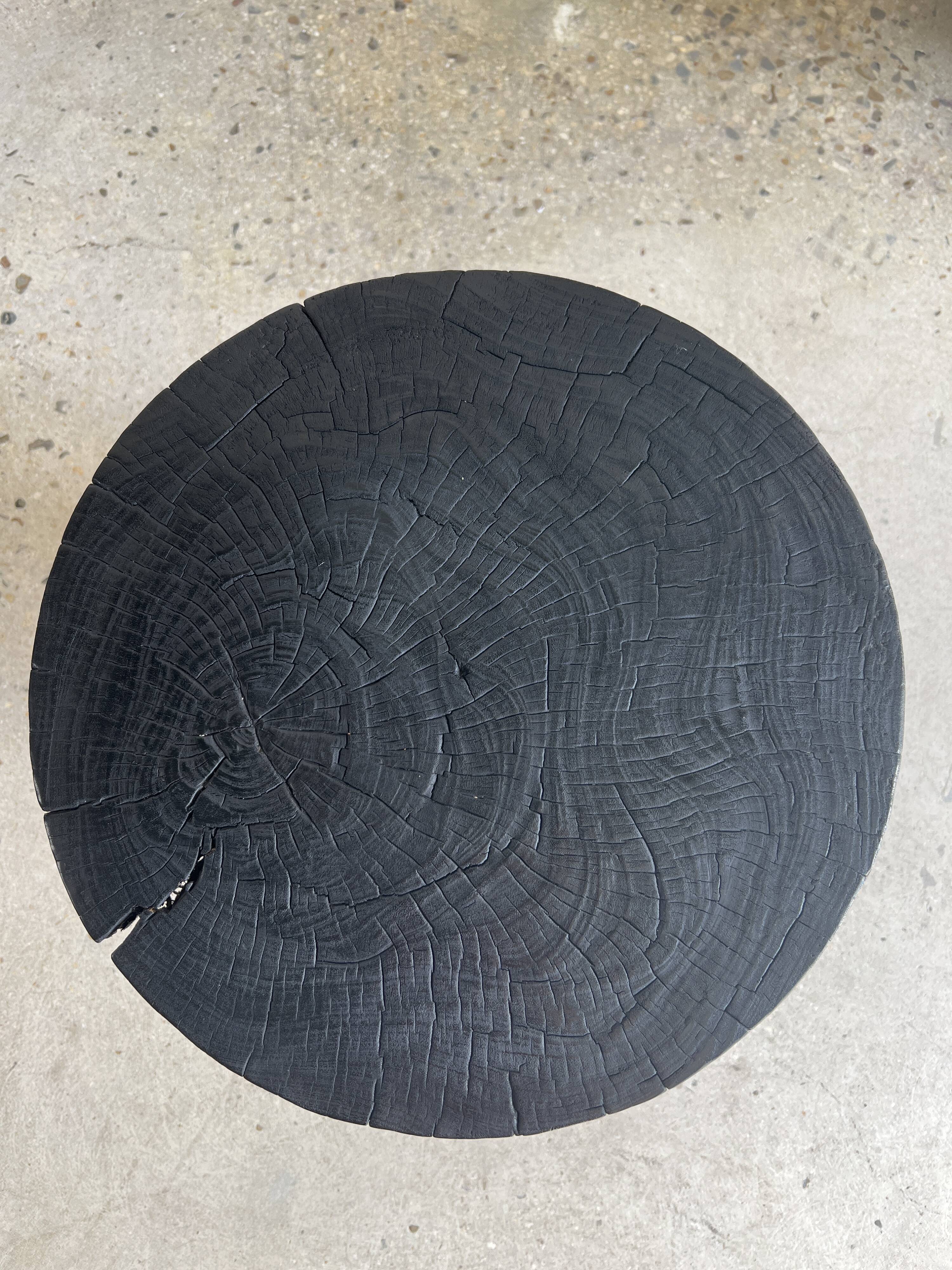 Solid wood (monoxyl) side table, organic shape, black color