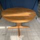 Table ronde en bois avec piétement style Baumann
