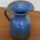 Glazed stoneware pitcher