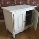 Small low cabinet with 2 doors