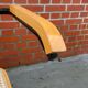 Cesca model chair designed by Marcel Breuer with black-framed armrests