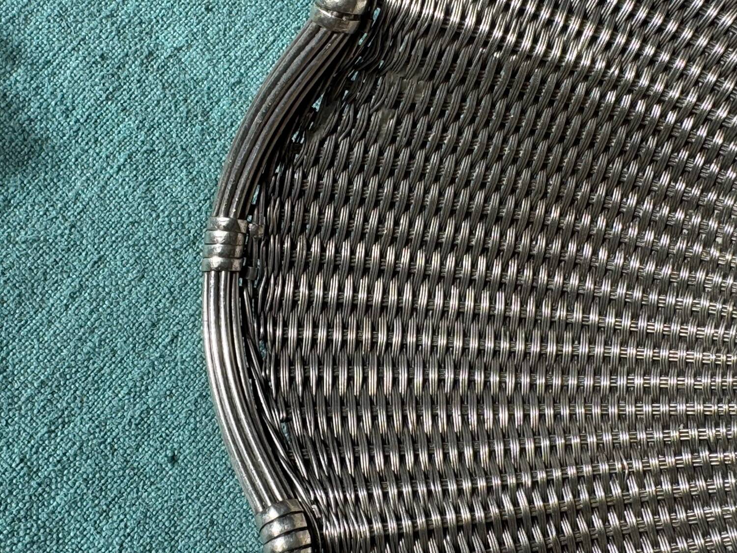 Vintage wicker basket in silver metal