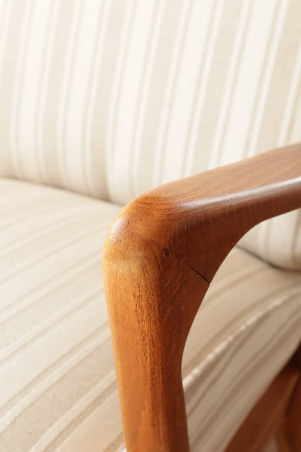 Scandinavian armchair in beige and white striped fabric