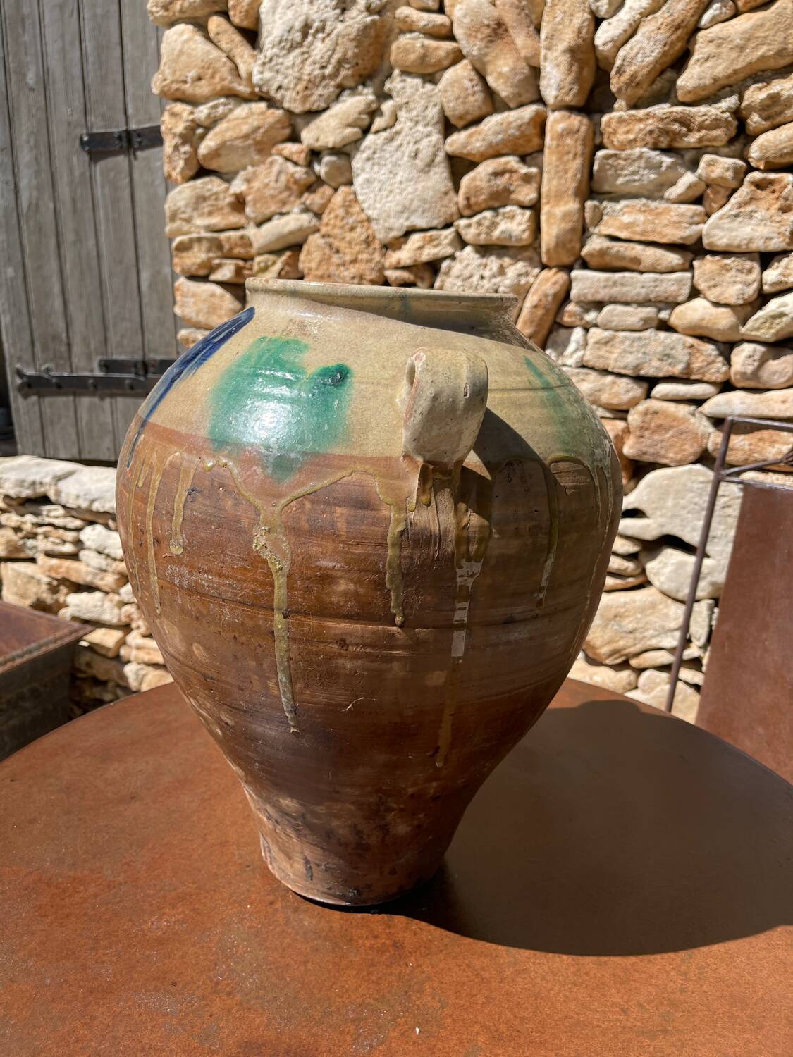 Ancient terracotta pottery jar from the 1920s.