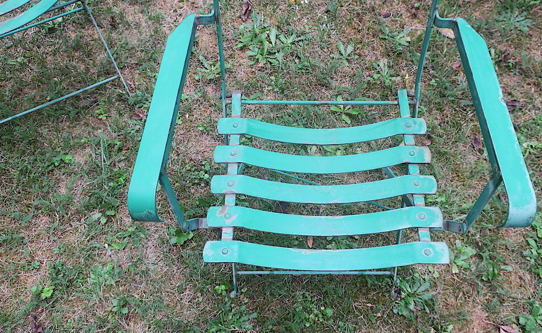 Pair of mid century distressed painted iron garden chairs