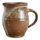 Small vintage hand turned ceramic milk jug with rustic glaze