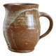 Small vintage hand turned ceramic milk jug with rustic glaze