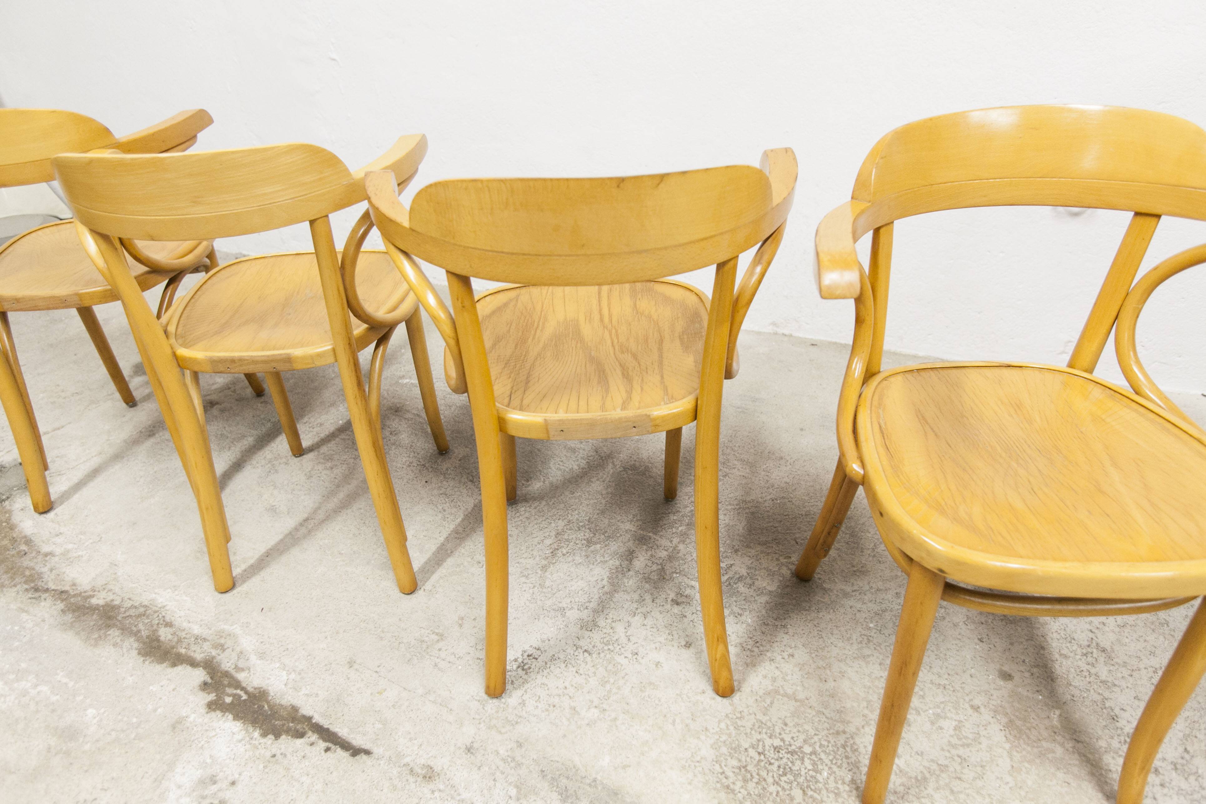 Set of 4 bistro armchairs with armrests from the 1960s.