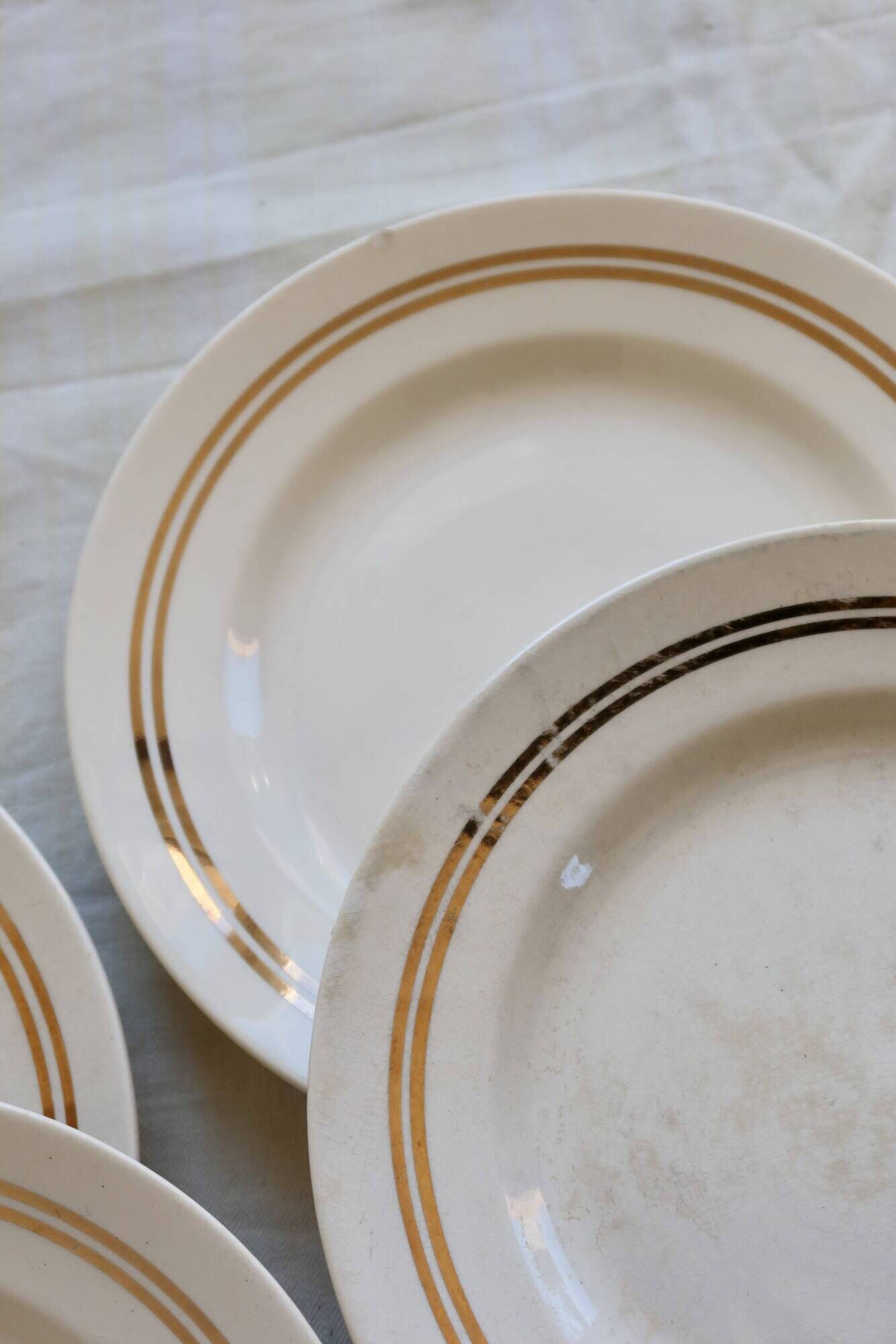 6 plates vintage ivory faience with gold trim