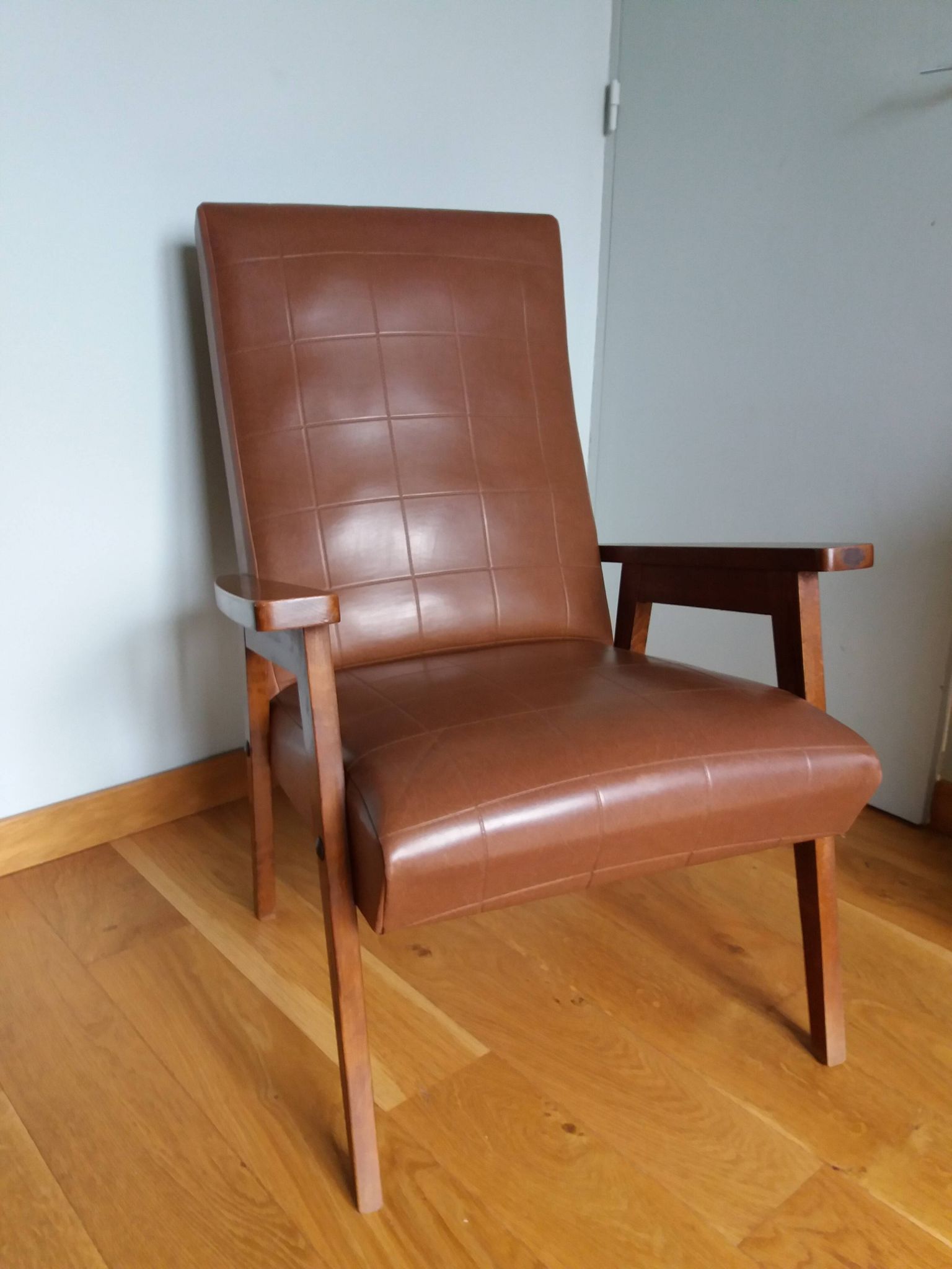 Scandinavian armchair in brown leatherette and wood