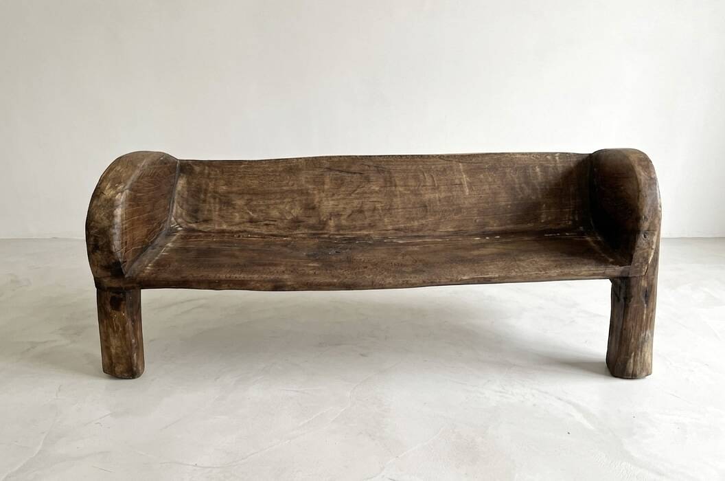 Traditional monoxyle bench in solid Indian wood.