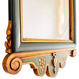 Antique full-length wall mirror in carved wood