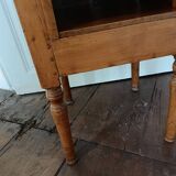 Open wooden bedside table