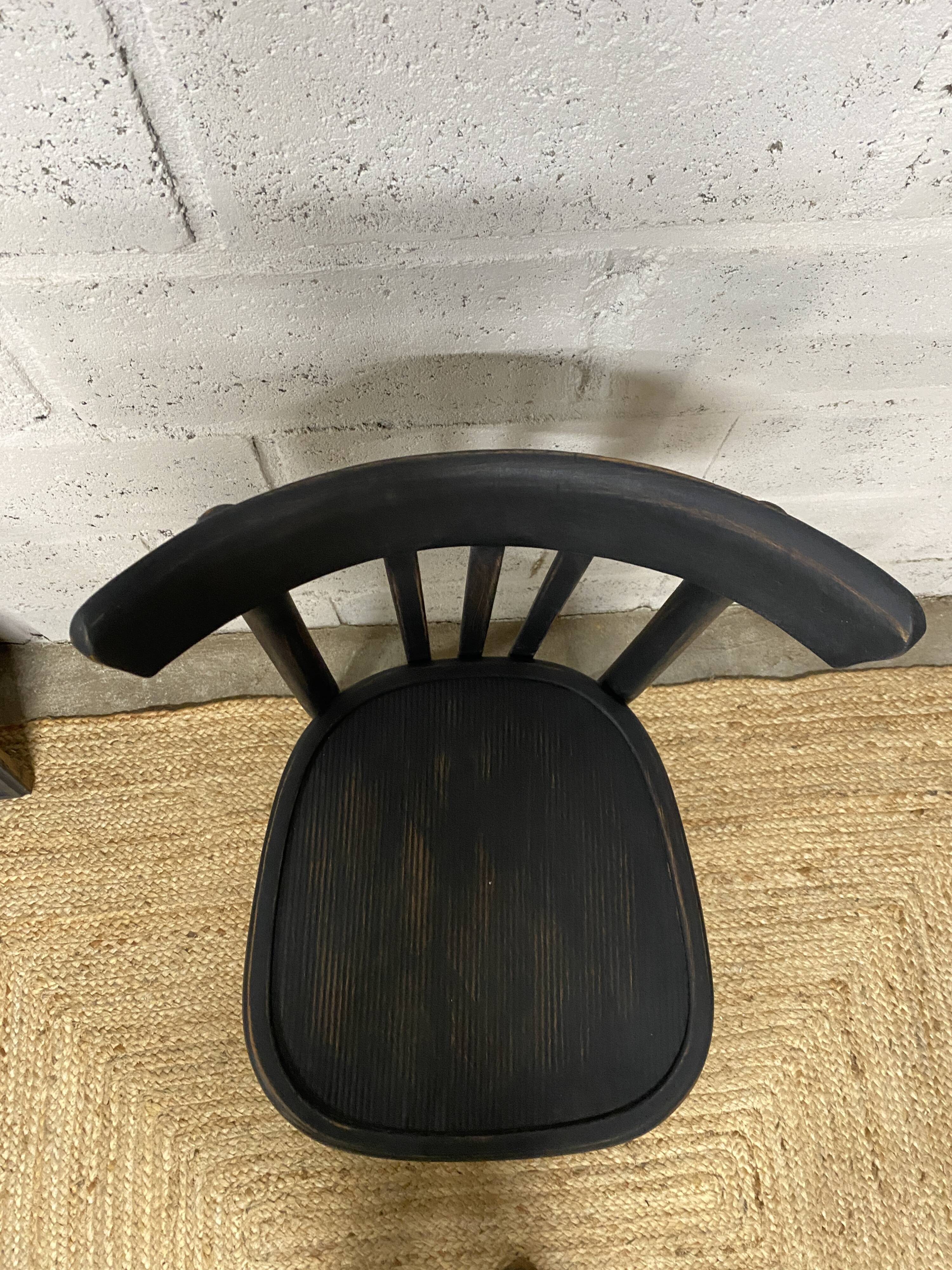 matte black bistro chair with a patina