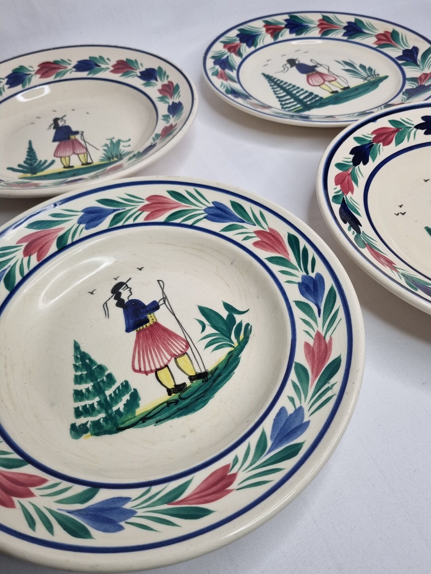 Set of 3 hollow plates and a henriot Quimper flat plate with traditional décor