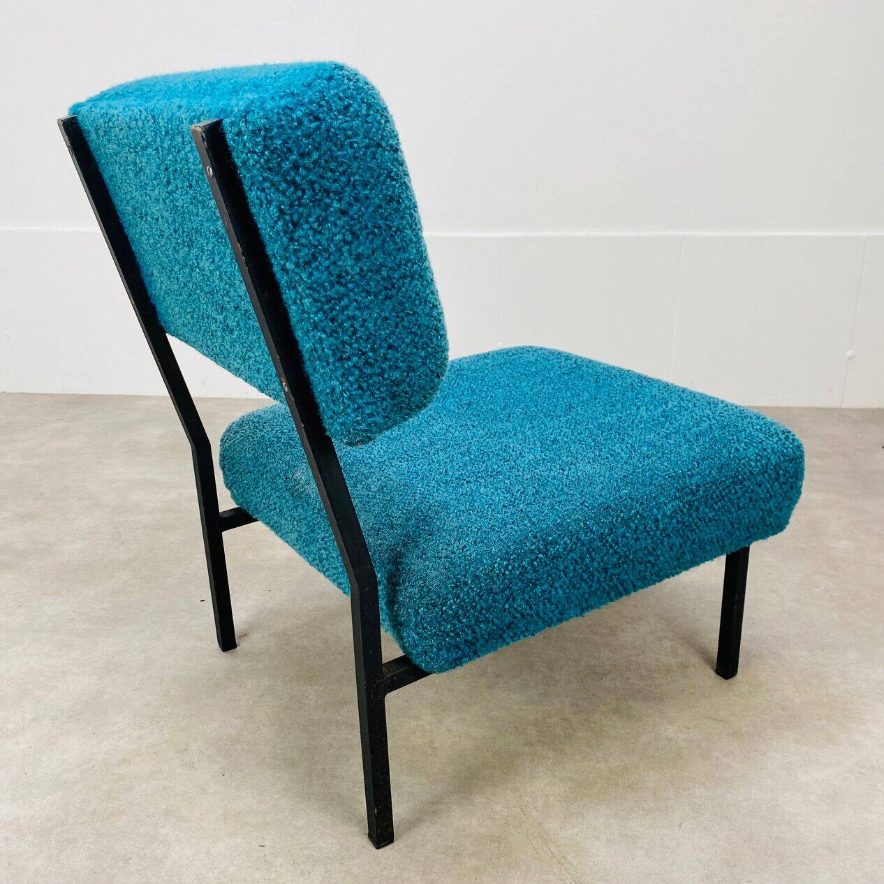 Modernist armchair from the 1950s in vintage blue boucle fabric.