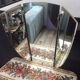 Hairdresser of the 50s and 60s with triptych mirror