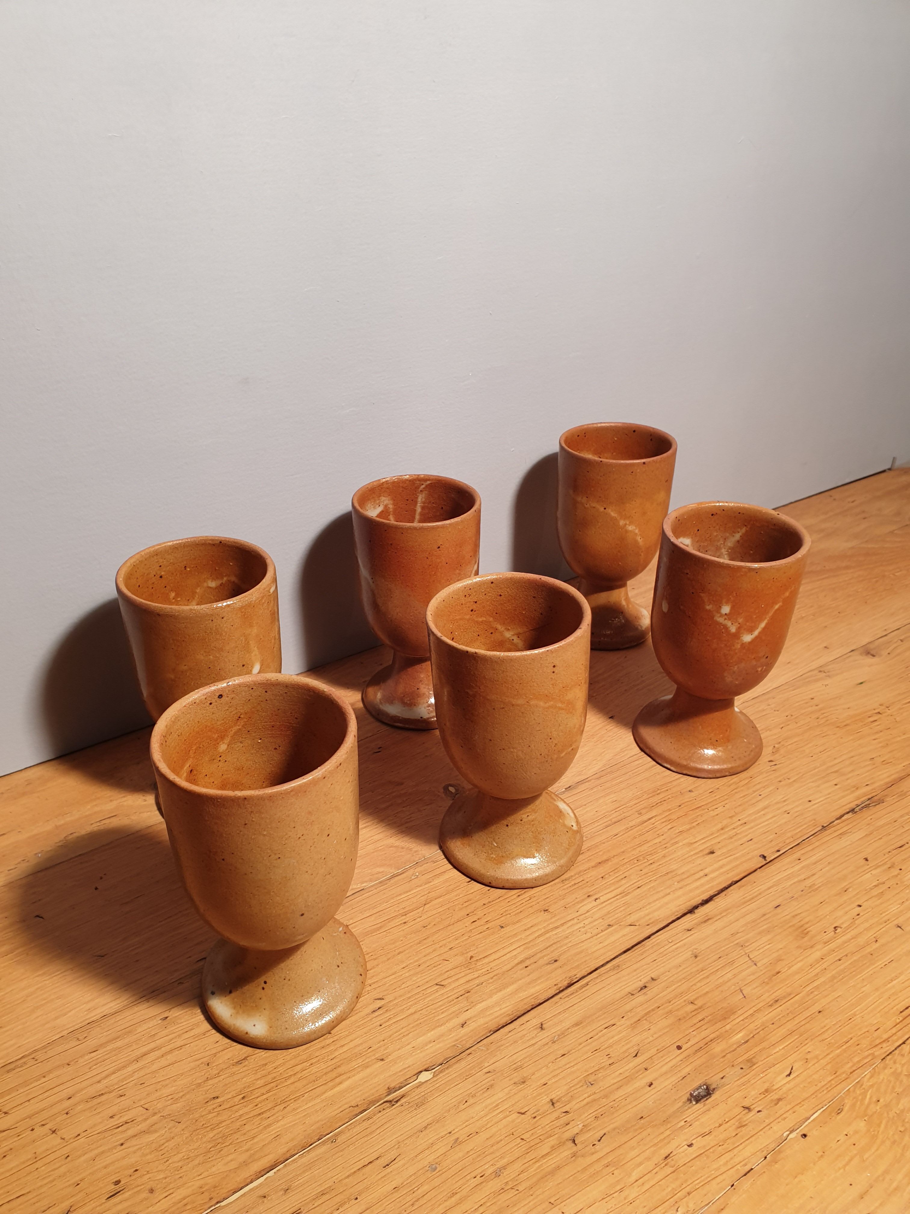Set of 6 sandstone foot glasses