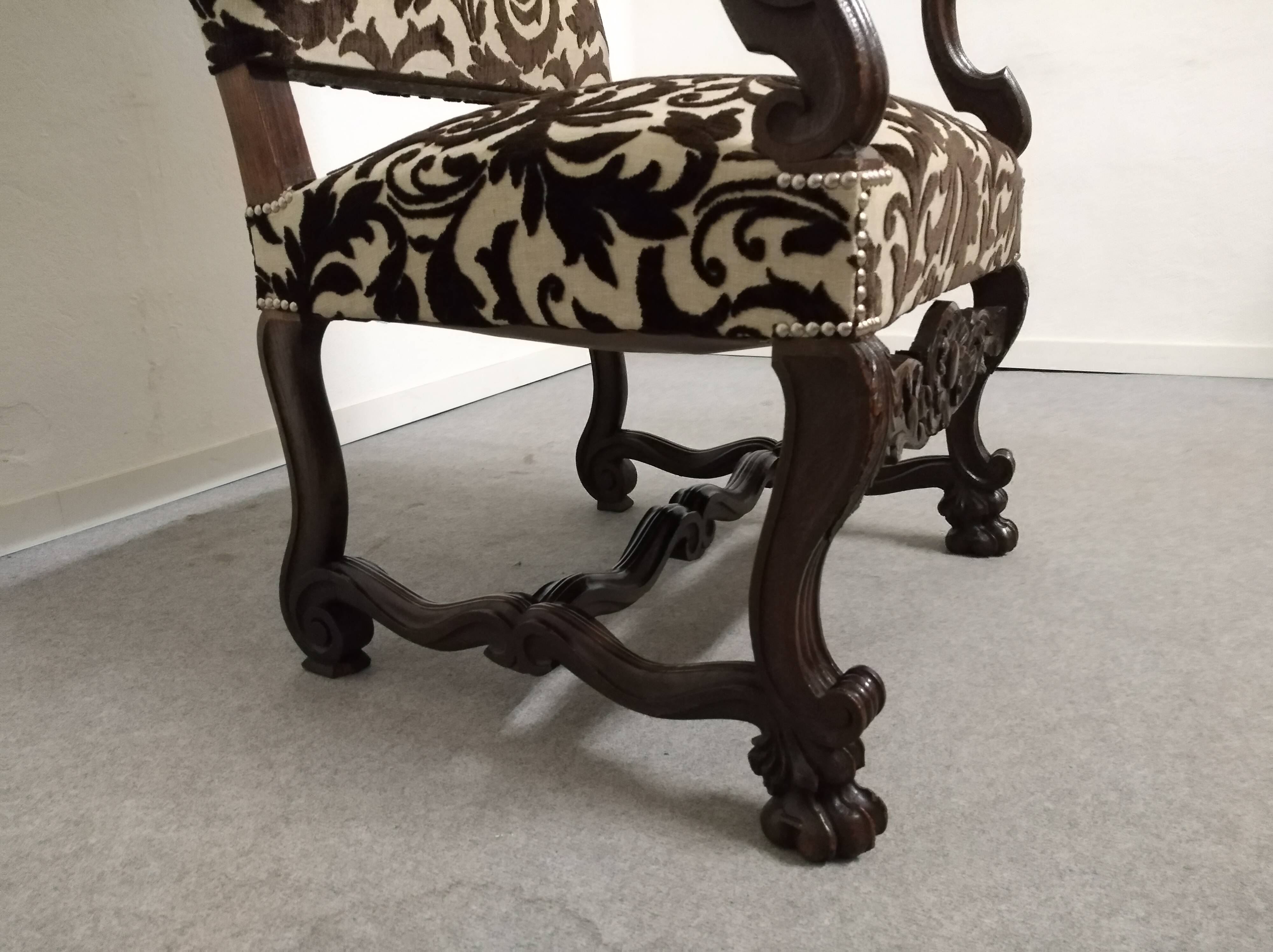 Pair of ceremonial armchairs in blackened oak, France late 18th century.