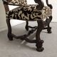 Pair of ceremonial armchairs in blackened oak, France late 18th century.