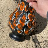Red orange enamelled pitcher