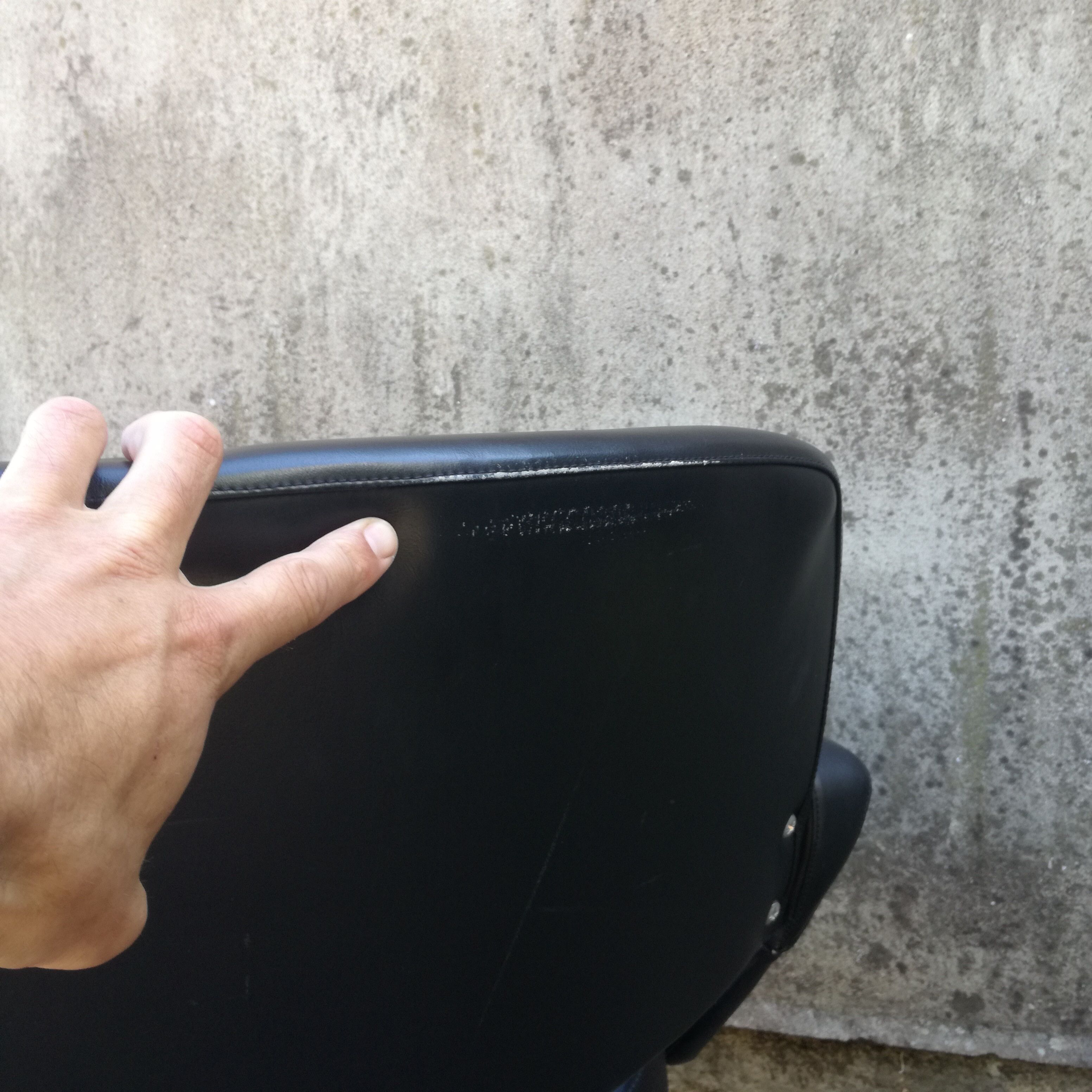 Black office chair in imitation leather