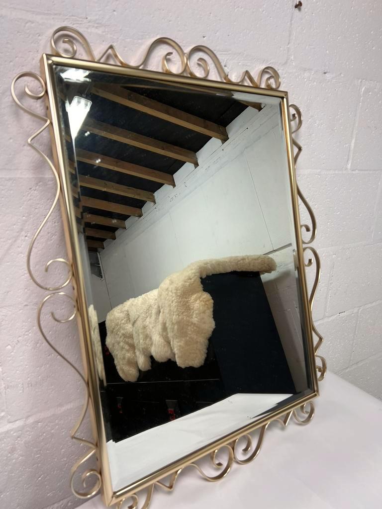 Miroir en or vintage avec cadre orné