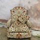 Fauteuil velours fleuri