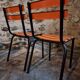 Set of 4 French industrial school chairs from the 1960s – Stackable chairs with metal slats.