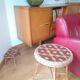 Rattan table and its small bench