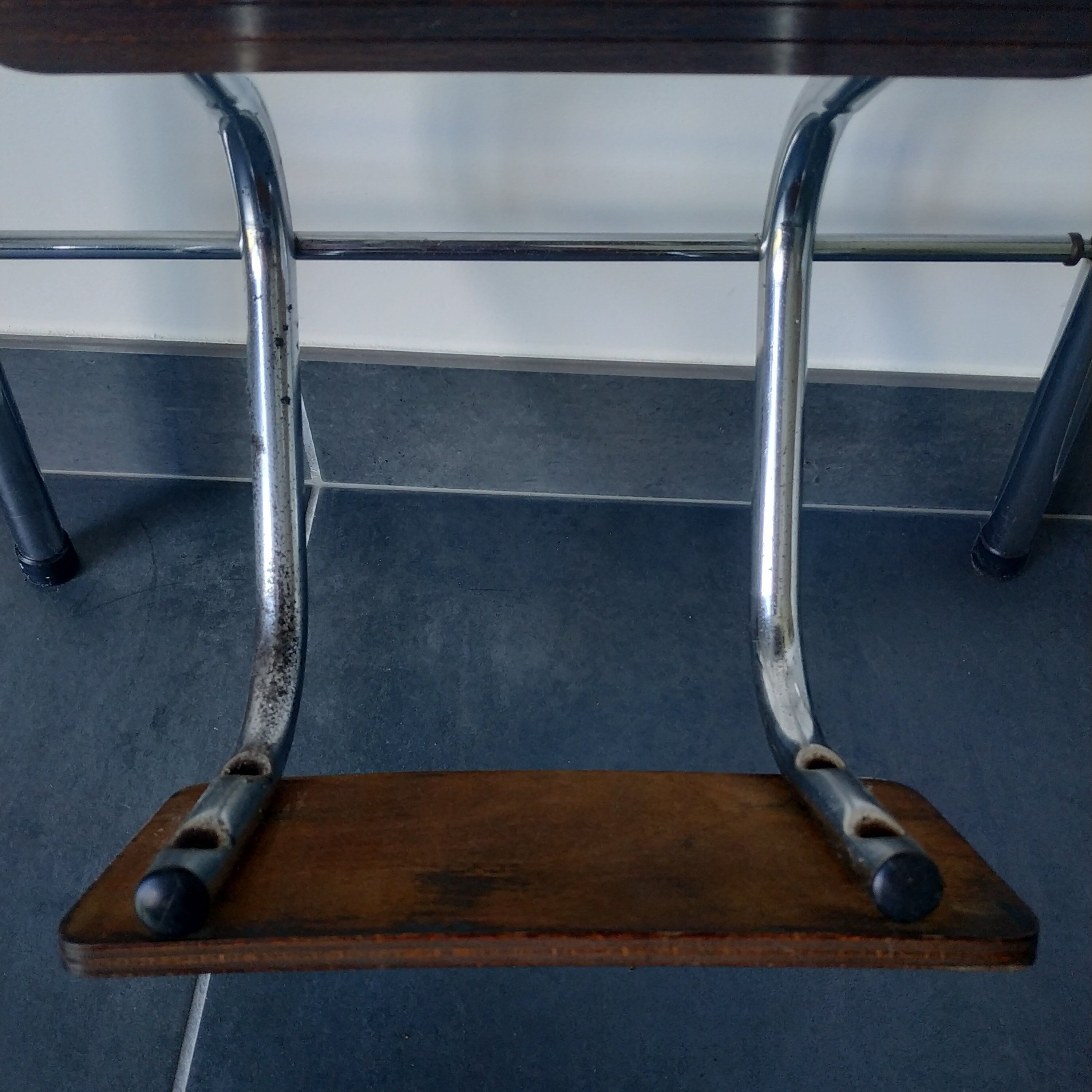 Old retractable wooden stepladder