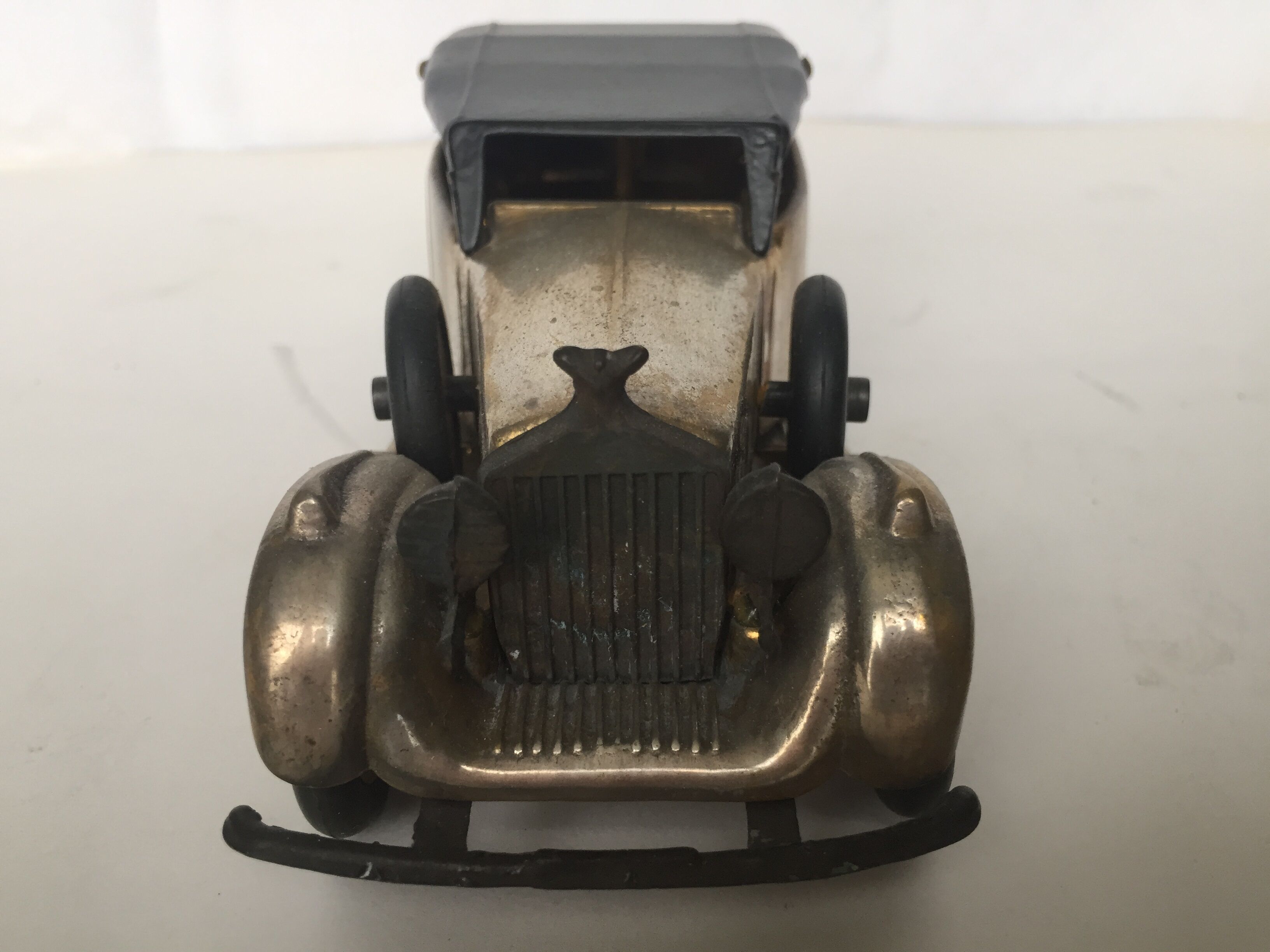 Ancient miniature metal car