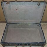 Old black wooden trunk with reinforcements