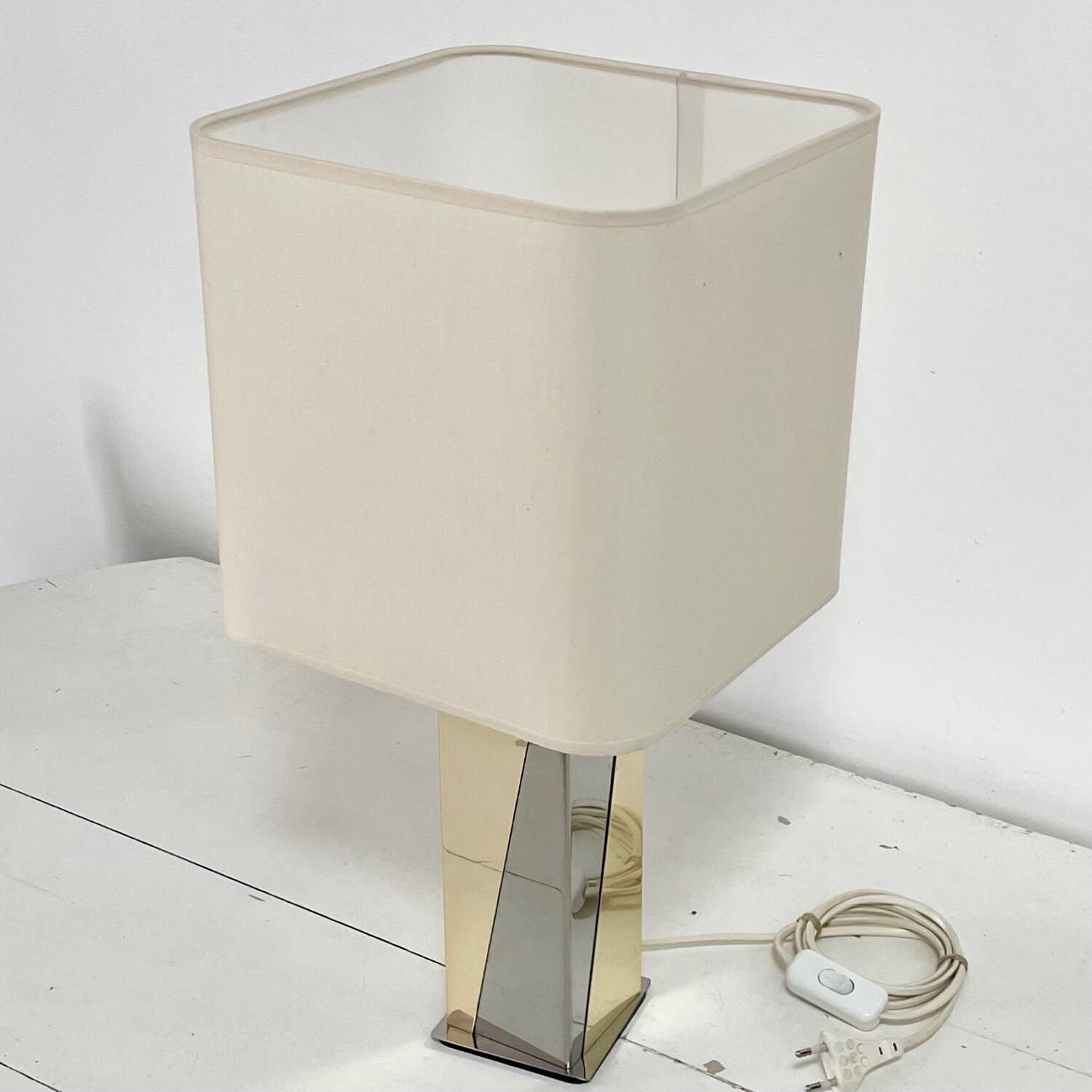 Chrome and gold metal lamp