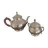 Teapot and sugar bowl in shiny tin