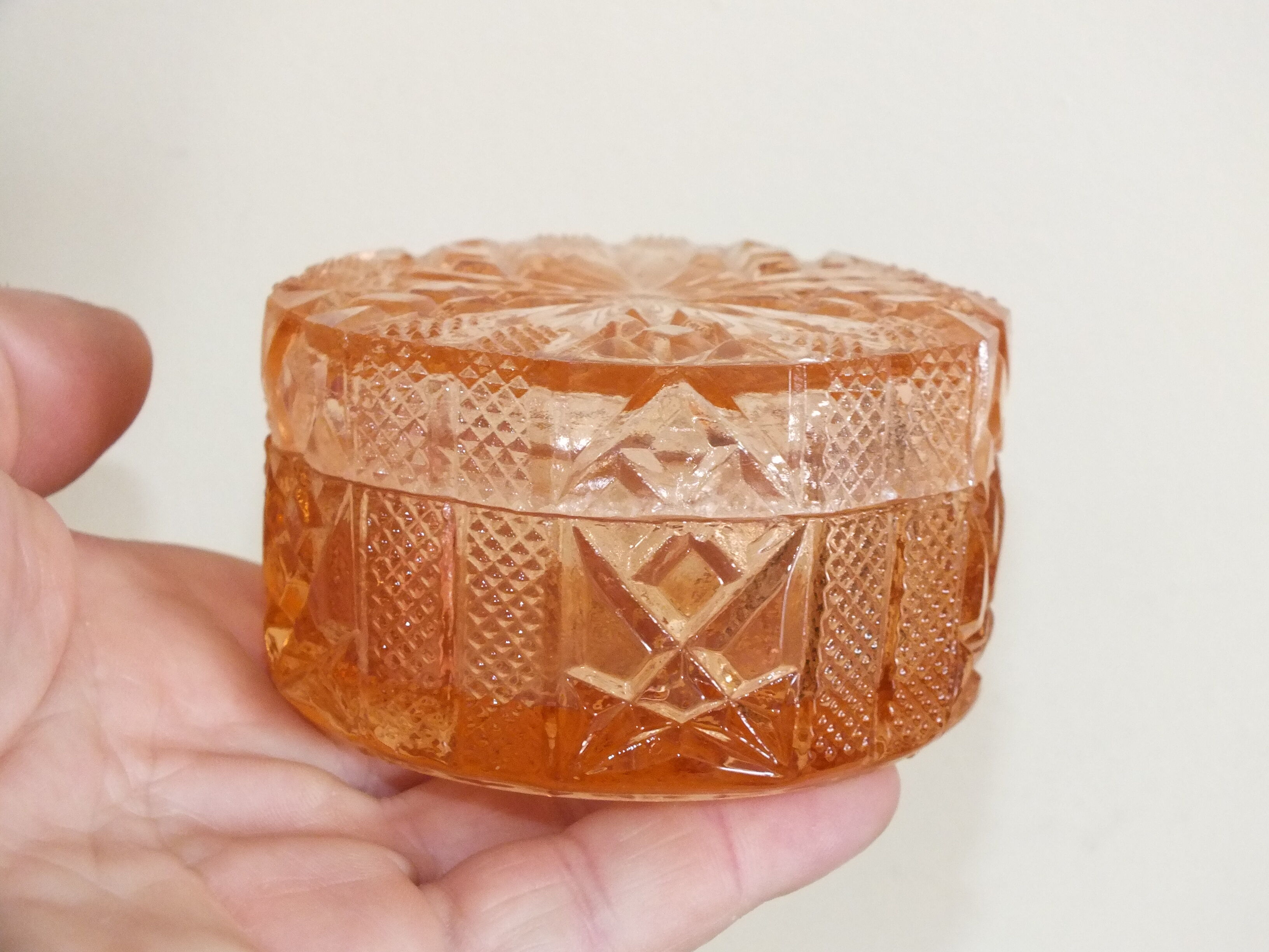 Pink tinted molded crystal powder box