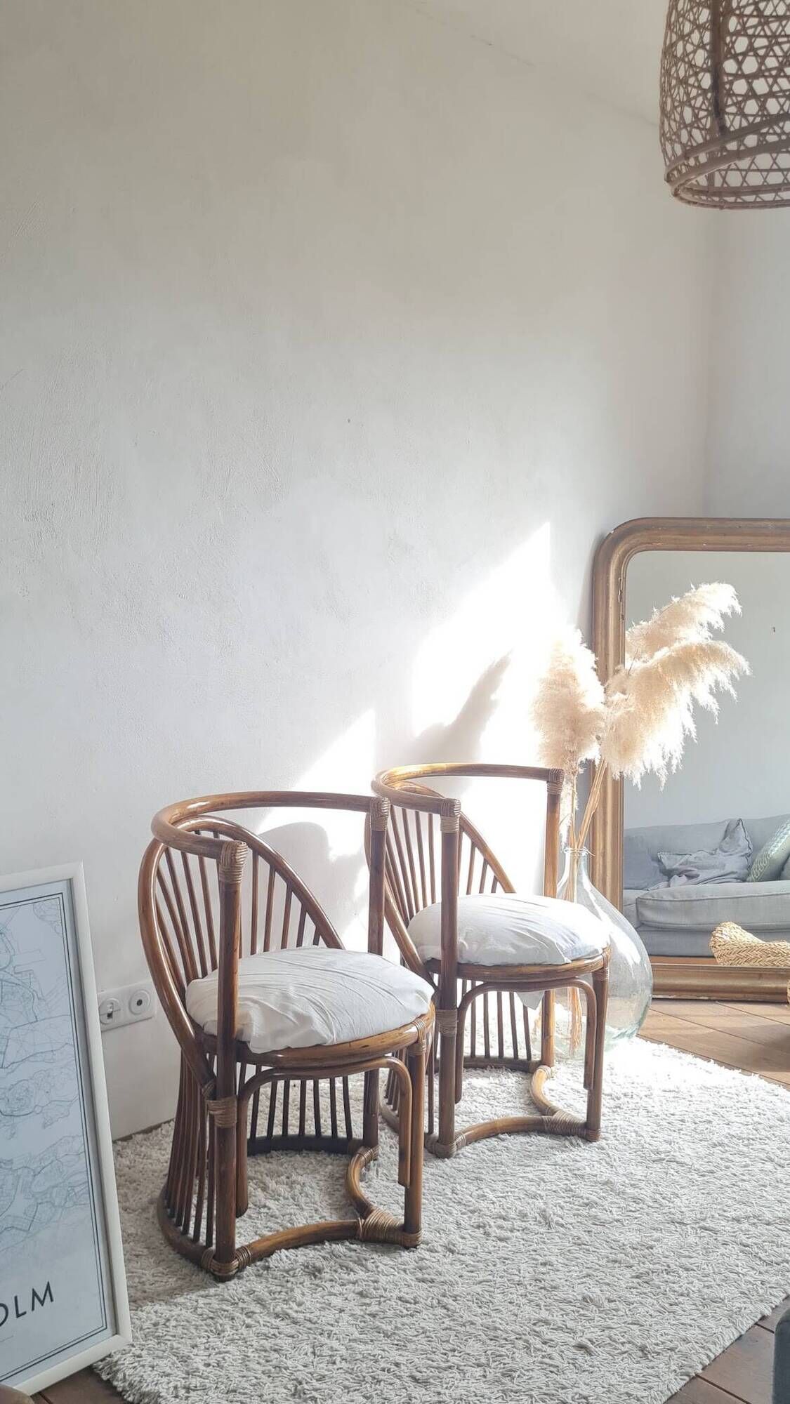 Pair of vintage rattan armchairs circa the 1960s.