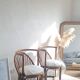 Pair of vintage rattan armchairs circa the 1960s.