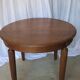 1930s oak dining table, slightly oval.