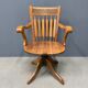 Antique American oak office chair with armrests 1920s