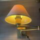 Pair of vintage brass wall lights with adjustable arms.