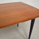 Expandable rectangular dining table