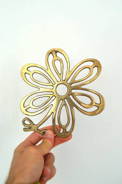 Brass flower trivet