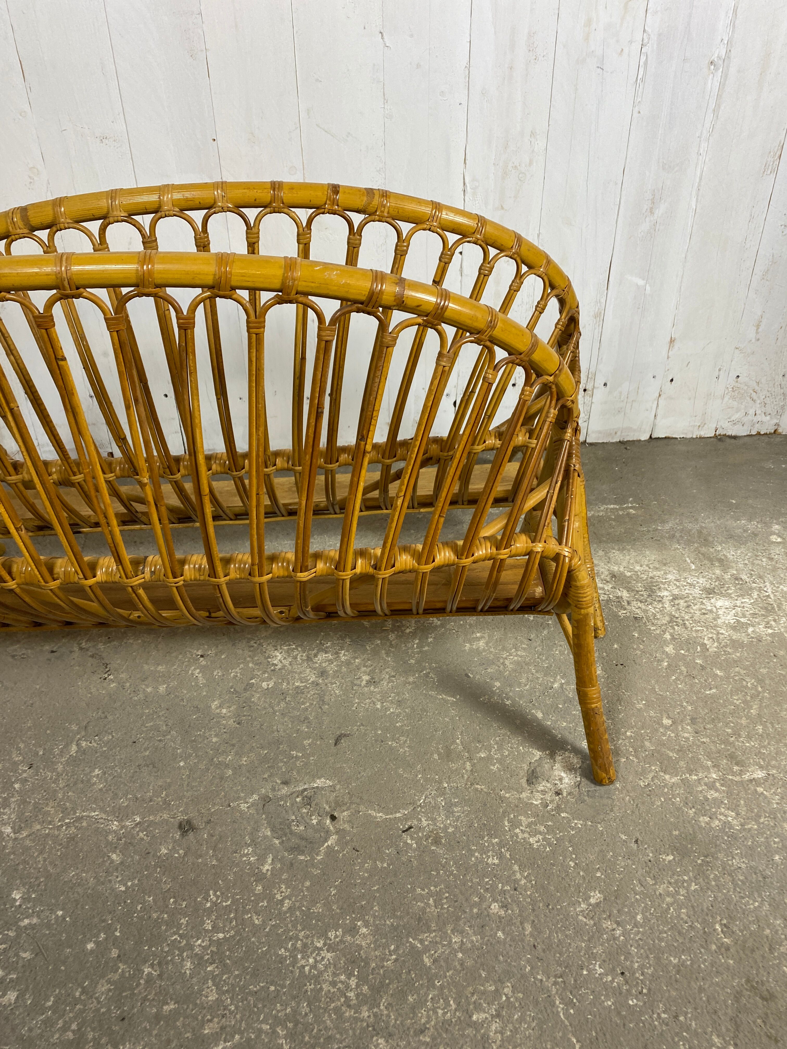 Antique rattan basket bed
