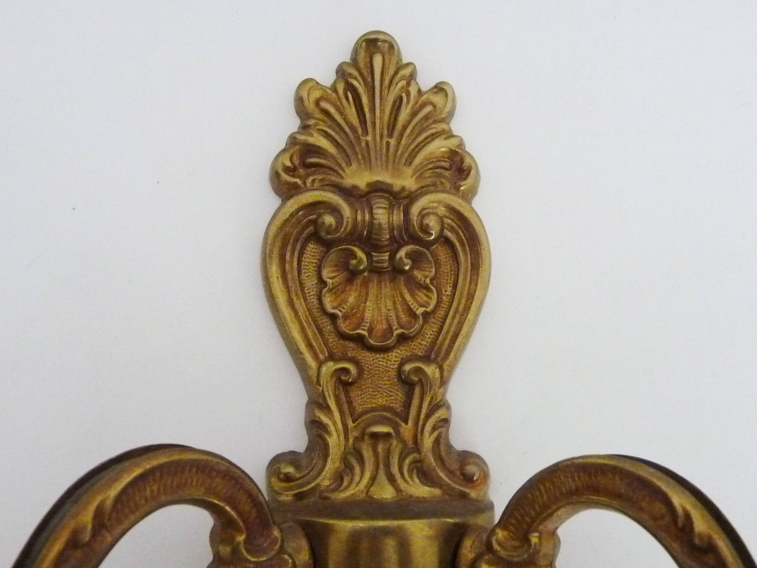 Old pair of double-light brass wall sconces. 60s