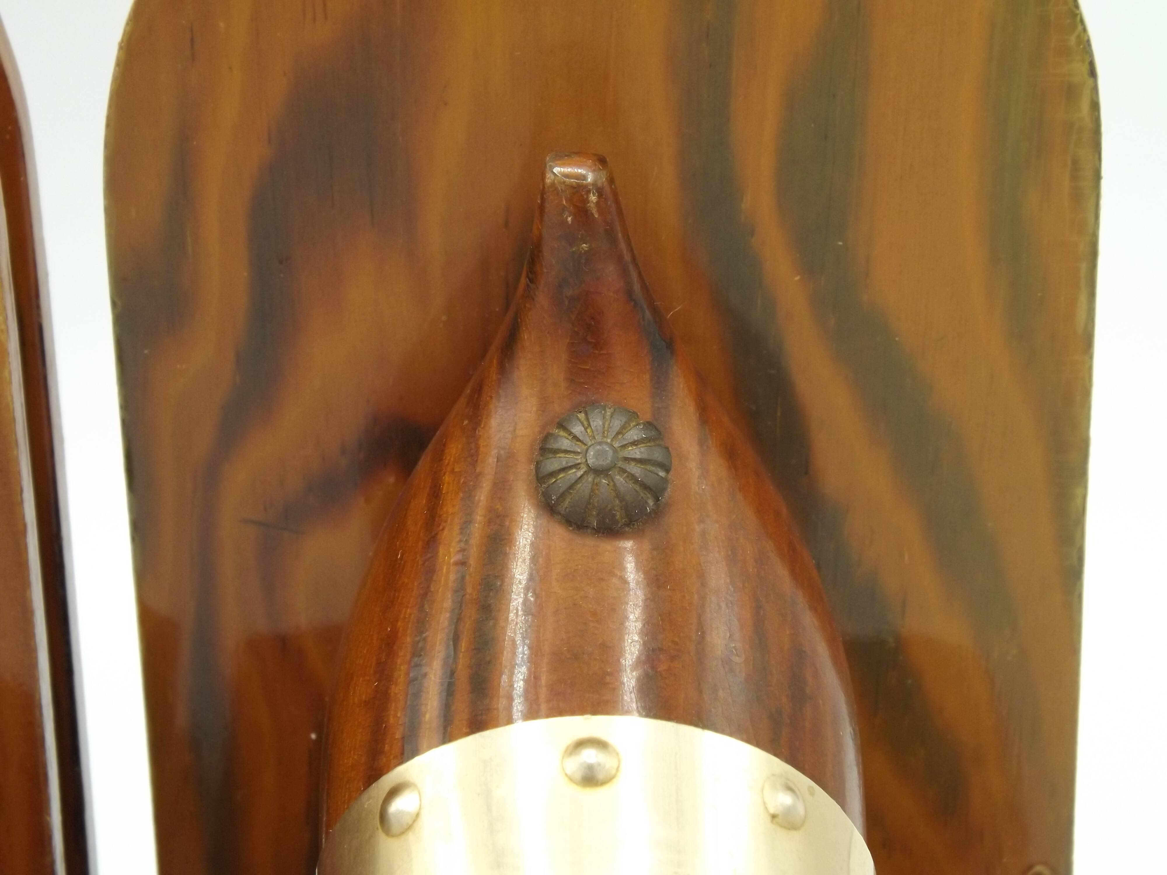 Vintage French Breton wooden bookends hand-carved with book and clog motif.