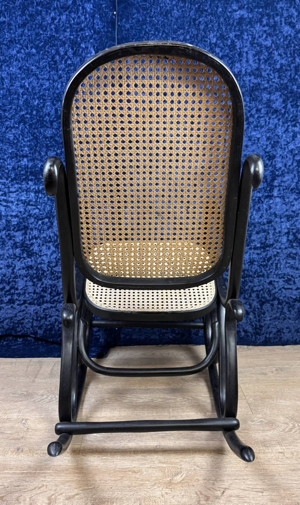 Beautiful rocking chair in the style of Thonet in blackened curved wood