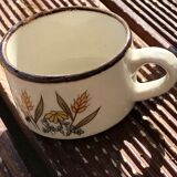 Cups and sandstone teapot