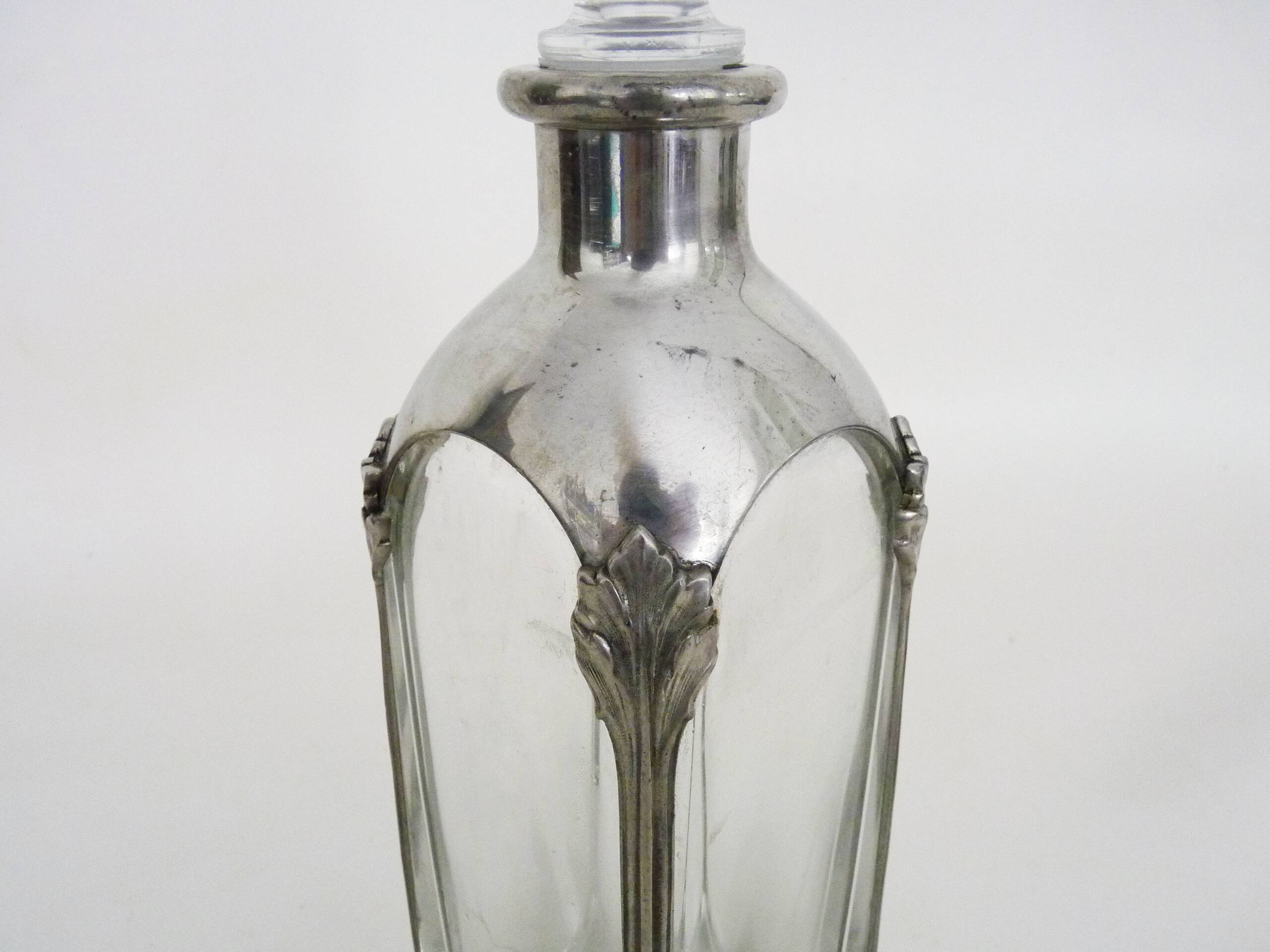 Magnificent crystal and silver-plated metal carafe bottle.