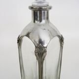 Magnificent crystal and silver-plated metal carafe bottle.